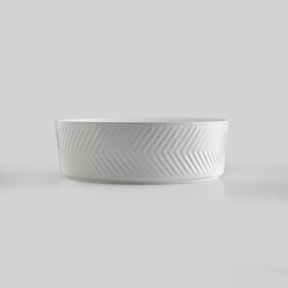 Cerazul - lavabo porcelánico sobre encimera modelo Espiga en formato circular.